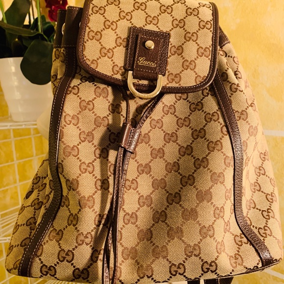 Gucci Handbags - Authentic Gucci Canvas with Leather Stripes Bag.